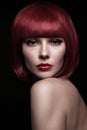 Portrait of young beautiful redhead woman with stylish bob Royalty Free Stock Photo