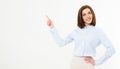 Portrait of young beautiful smile business woman pointing at white background Royalty Free Stock Photo