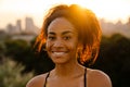 Young beautiful smiling happy curly african woman looking at camera Royalty Free Stock Photo