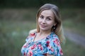 Portrait of young beautiful smiling woman in flower vintage dress Royalty Free Stock Photo