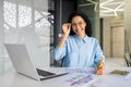 Portrait of young beautiful and successful financial accountant at workplace inside office, business woman smiling and Royalty Free Stock Photo