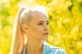 Portrait of young and beautiful teen girl at summer. Attractive blond woman over natural background. Royalty Free Stock Photo