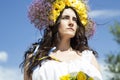 Portrait of young beautiful woman with circlet of flowers on her Royalty Free Stock Photo