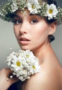 Portrait of young beautiful woman with flowers Royalty Free Stock Photo