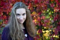 Beautiful young woman outside  in autumnal nature Royalty Free Stock Photo