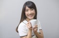 Portrait of young beautiful woman having a cup of coffee Royalty Free Stock Photo