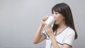 Portrait of young beautiful woman having a cup of coffee Royalty Free Stock Photo