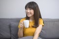 Portrait of young beautiful woman having a cup of coffee Royalty Free Stock Photo