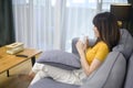 Portrait of young beautiful woman having a cup of coffee Royalty Free Stock Photo