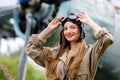 Portrait of a young beautiful woman in a helmet and pilot`s suit Royalty Free Stock Photo