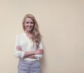 Portrait of young beautiful woman with long hair have fun and good mood looking in camera and smiling, warm, tonning Royalty Free Stock Photo