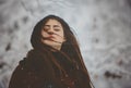 Portrait Young beautiful woman throws snow Royalty Free Stock Photo
