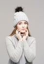 Portrait of a young and beautiful woman in a winter hat Royalty Free Stock Photo