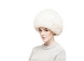 Portrait of a young and beautiful woman in a winter hat Royalty Free Stock Photo