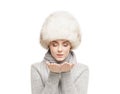 Portrait of a young and beautiful woman in a winter hat Royalty Free Stock Photo