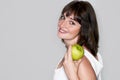 Portrait of young beauty woman with green apple Royalty Free Stock Photo