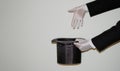 Portrait of young black Illusionist magician doing magic with a top hat Royalty Free Stock Photo