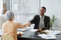 Candidate Shaking Hands With Recruiter in Job interview Royalty Free Stock Photo