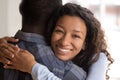 Portrait of young black smiling wife embracing husband Royalty Free Stock Photo