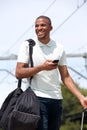 Young black traveler walking on railway station Royalty Free Stock Photo