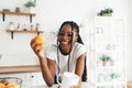 Portrait of young black woman drinking a cup of coffee or tea in the morning Royalty Free Stock Photo