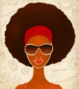 Portrait of a young black woman on ethnic background, model of fashion Royalty Free Stock Photo