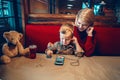 Mother and toddler boy son at restaurant Royalty Free Stock Photo