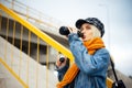 Portrait of young blonde teenage girl drinking water from steel thermo eco bottle. Royalty Free Stock Photo