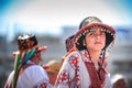 Portrait of a young boy dressed in a traditional costume of the Romanian ancient dancers Calusarii