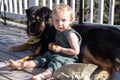 Portrait of young boy with family dog Royalty Free Stock Photo