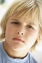 Portrait Of Young Boy Frowning Royalty Free Stock Photo