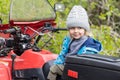 Portrait of young boy on quad bike Royalty Free Stock Photo