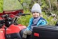 Portrait of young boy on quad bike Royalty Free Stock Photo