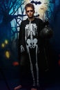 Portrait of young boy in skeleton costume with makeup. Celebration of holiday Halloween, the boy in the image, the skeleton theme Royalty Free Stock Photo