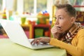 Young boy using laptop Royalty Free Stock Photo