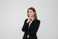 Portrait of young brown-haired businesswoman in suit Royalty Free Stock Photo