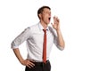 Portrait of a young brunet man posing in a studio isolated over a white background. Royalty Free Stock Photo