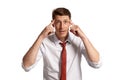 Portrait of a young brunet man posing in a studio isolated over a white background. Royalty Free Stock Photo