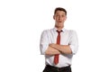 Portrait of a young brunet man posing in a studio isolated over a white background. Royalty Free Stock Photo