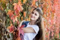 Portrait of a young brunette girl looking at the camera and smiling Royalty Free Stock Photo