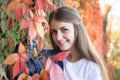 Portrait of a young brunette girl looking at the camera and smiling Royalty Free Stock Photo