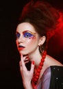 Portrait of young brunette woman with artistic make-up, close up. Beauty concept.