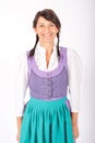 Portrait of young brunette woman wearing bavarian dirndl Royalty Free Stock Photo