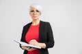 Portrait of young buisness lady in black costume isolated on background Royalty Free Stock Photo