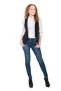 Portrait of young business girl with curly hair in jeans. Royalty Free Stock Photo