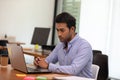 Portrait of Young business indian man working Royalty Free Stock Photo