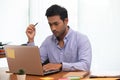 Portrait of Young business indian man working Royalty Free Stock Photo