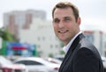 Portrait of a young business man in a dark suit and white shirt Royalty Free Stock Photo