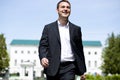 Portrait of a young business man in a dark suit and white shirt Royalty Free Stock Photo