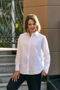 Portrait of young business woman in formal clothing. Model demonstrates classic style in clothes